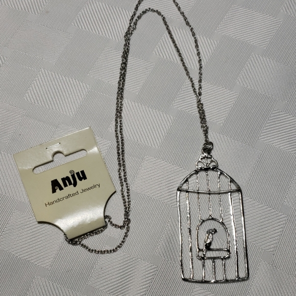 ANJU Bird In A Cage Silver tone Necklace NWT